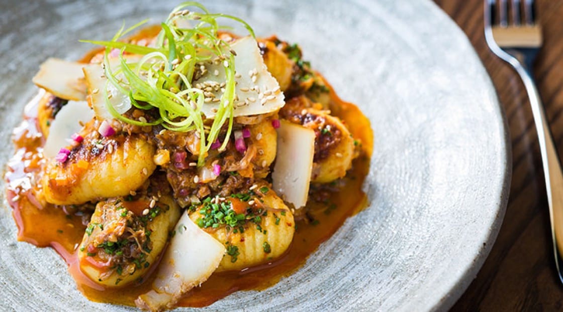 The “Gnocchi Bokki” at Hazel, served with pork-kimchi ragú, sesame seeds and smoked Pecorino.