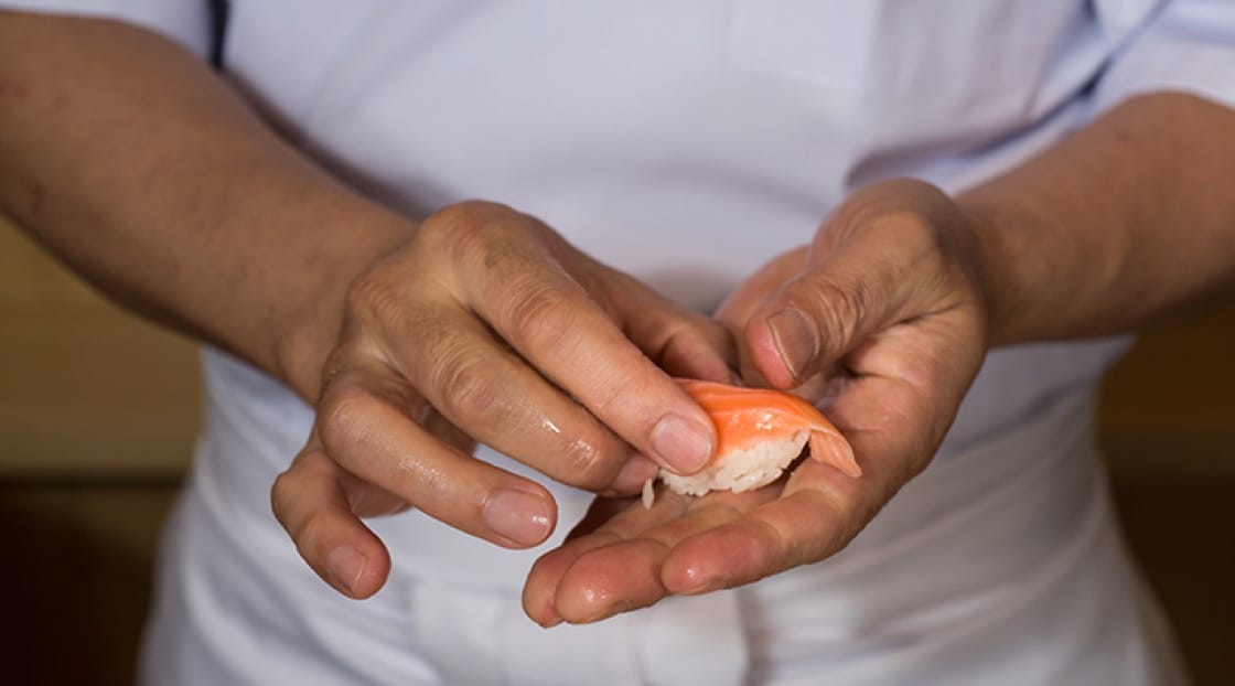 Chef Tatsu preparing sockeye salmon.