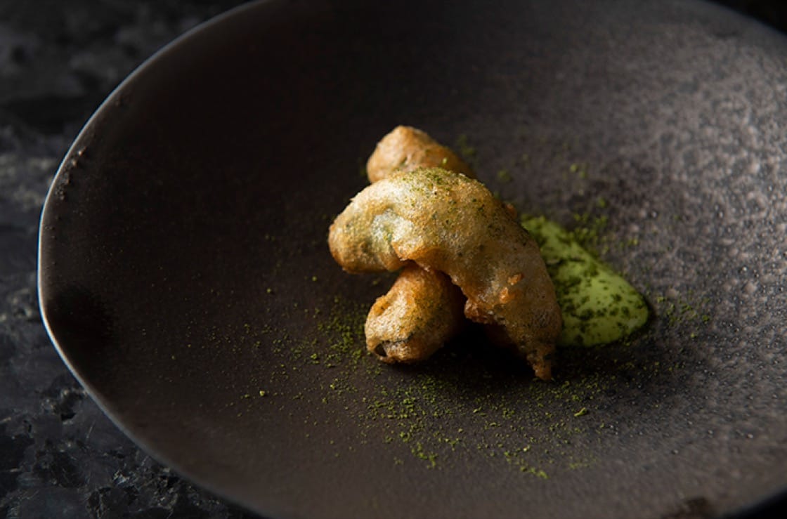 'Twigim' features fried langoustines with nasturtium, chopi pepper and anise hyssop. (Photo by Evan Sung.)