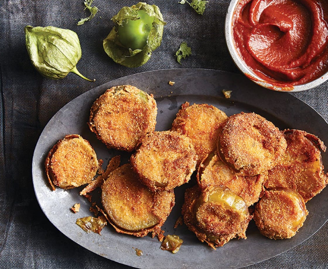 Fried green tomatillos with ancho chile barbecue sauce. (Photo by Greg DuPree.)