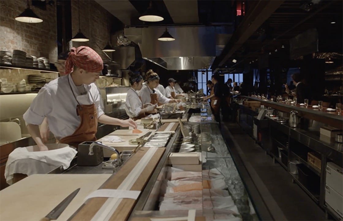 An open kitchen greets guests as they enter Tetsu. 