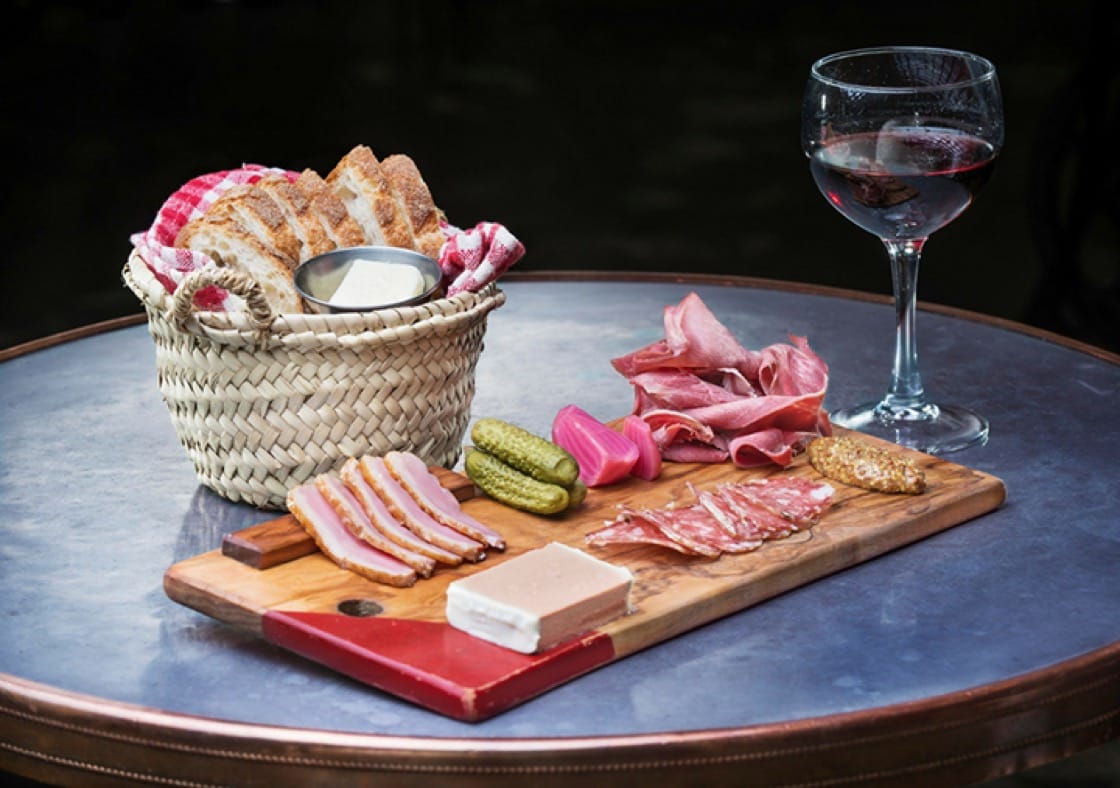 Charcuterie at the bustling Au Comptoir. (Photo courtesy of Au Comptoir.)