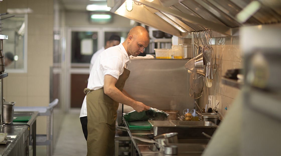 Chef Jimmy cooking in the kitchen at PRU.