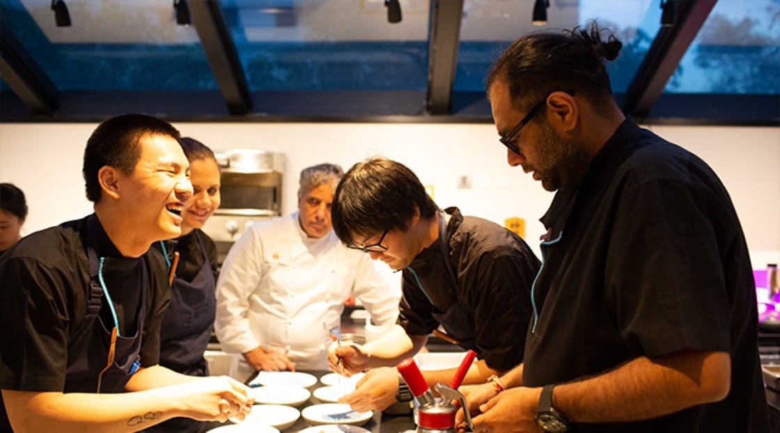 Chef Gaggan runs the kitchen as a family and passes down his know-how to the younger generation.