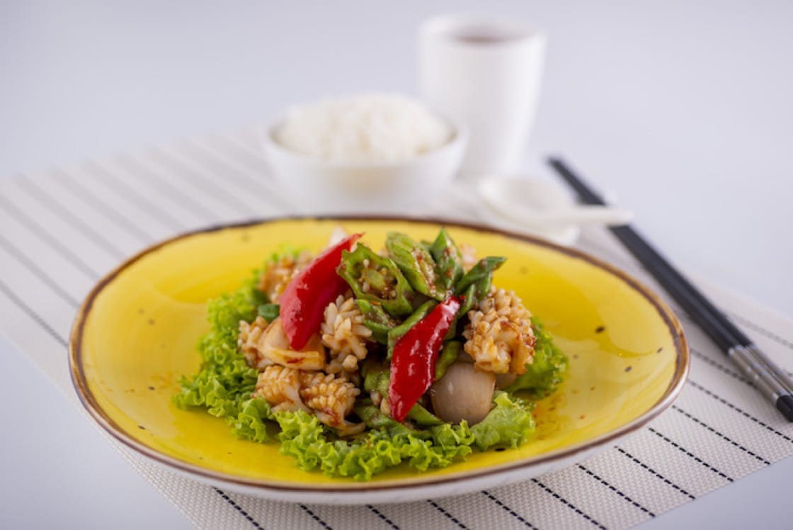 Wok-fried squid and lady’s finger tossed in pungent cincalok (fermented shrimp) sauce. (Credit: Famous Treasure) 