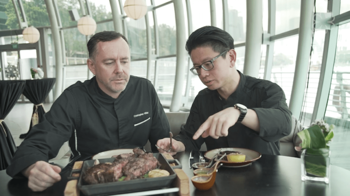 (from left) Chef Christopher Millar and Chef Felix Chong with the Mayura Fiorentina steak that is served in Monti.