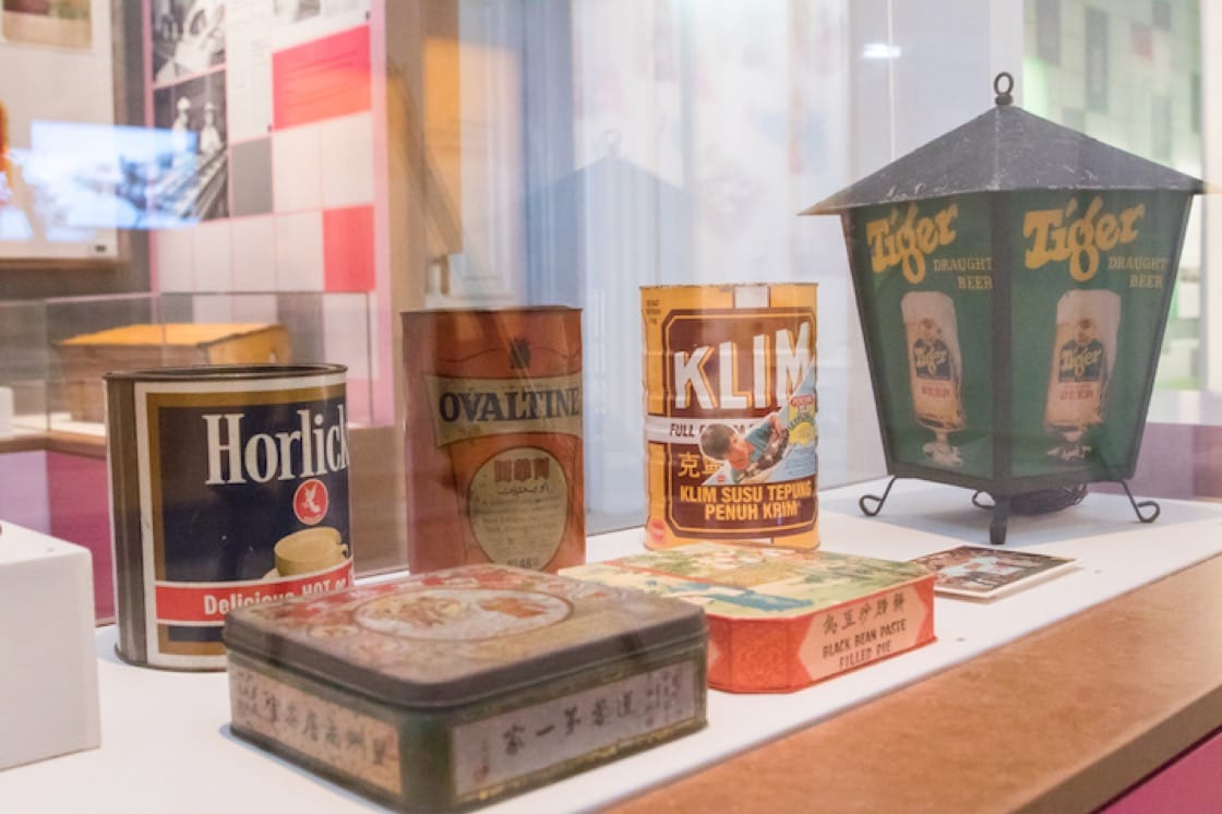 Tins for malted drinks and baby food that date back to the 1940s to 1990s. (Photo: National Museum of Singapore)