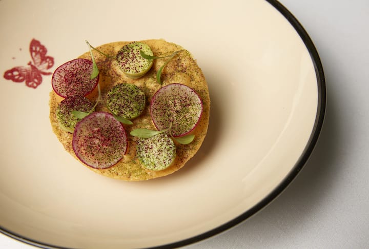 Chef Karime Lopez brings in her Mexican heritage by introducing a tostada into the menu. (Photo: Gucci Osteria)