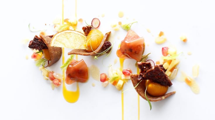 Blood orange. Amerigo Sesti's cuisine combines French cooking techniques with Thai ingredients. Photo courtesy of J'AIME by Jean-Michel Lorain.