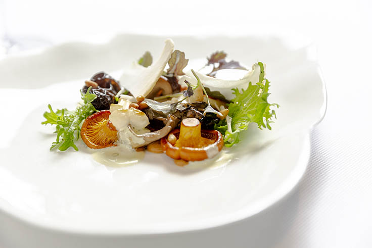 Foraged mushrooms, mustard frills and pine nut emulsion. (Photo by Mark Abramson.)