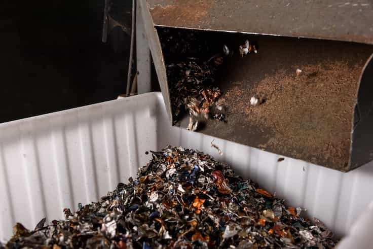 Coffee grounds and used aluminium capsules are being separated at a local plant in Hong Kong as part of Nespresso's recycling process. (Pic: Nespresso)