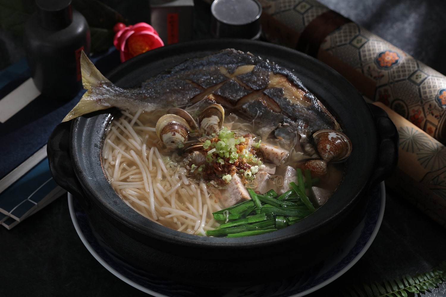 White pomfret noodle soup from one MICHELIN-starred Mountain and Sea House.