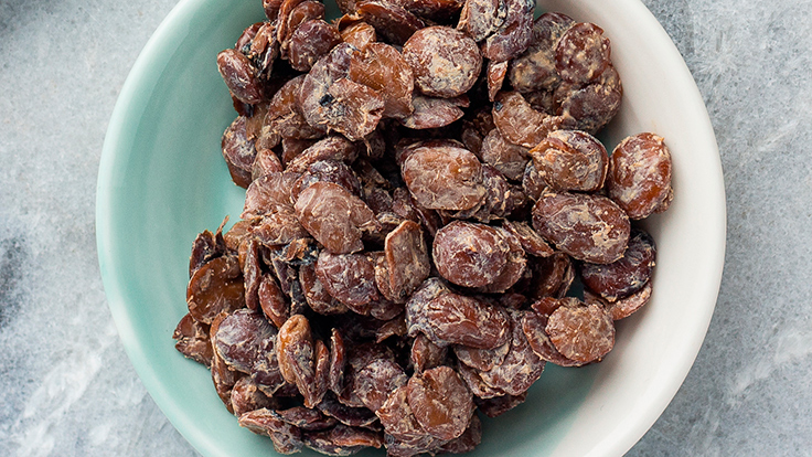 Iru or fermented locust beans. © Abimbola Olayiwola/Shutterstock