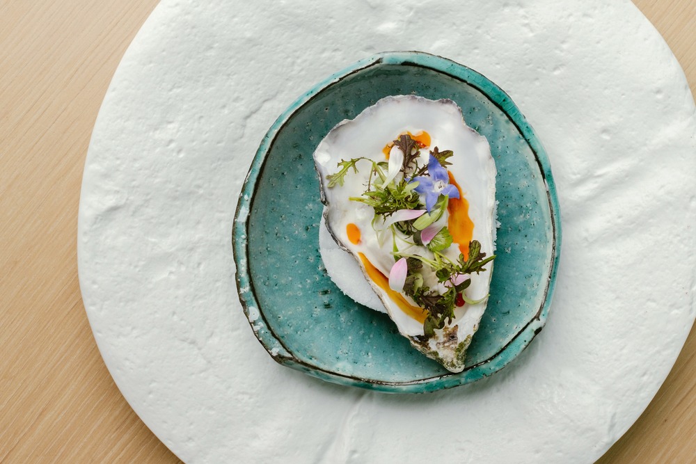 Tom Kha galangau and coconut oyster, one of the appetiser from Plaa（Photo:Plaa）