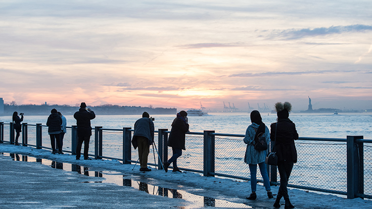 Looking towards Governors Island and the Statue of Liberty from Brooklyn Bridge Park © Julienne Schaer/NYC & Company