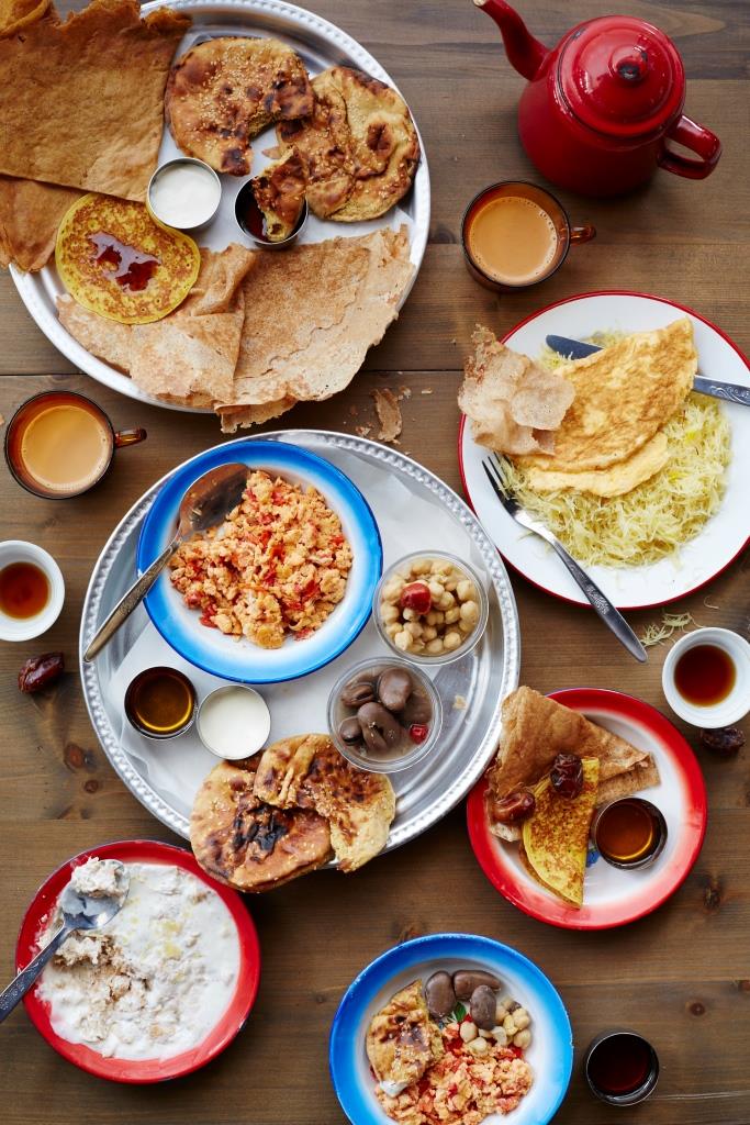 A traditional Emirati breakfast feast, including chebab, balaleet and harees. Image credit: Carl Llio/Meylas