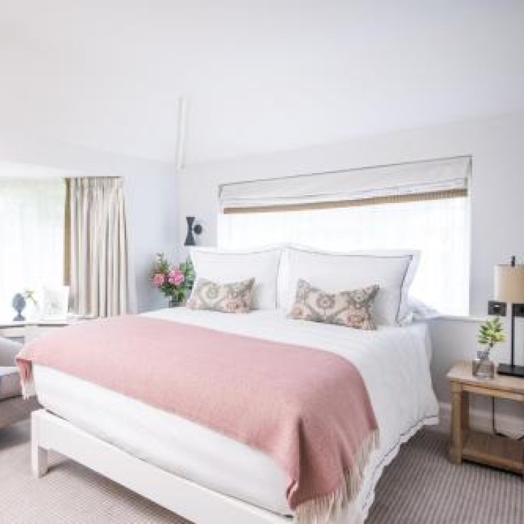 One of the modern English country-style bedrooms. © Monkey Island Estate