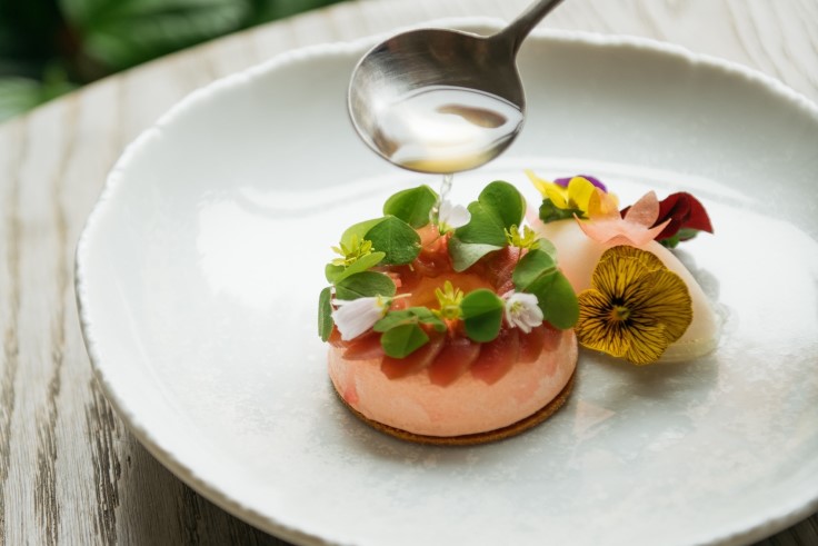 A dessert of rhubarb posset with birch sap, lilac sorbet, rhubarb wine and meadow flower sauce (© Barents, Riga)