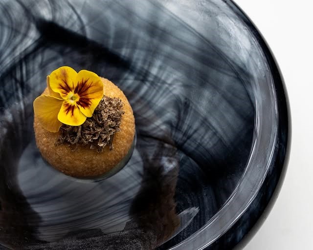 Known as the "Explosion" on the tasting menu, this first course at moonrise uses date syrup paired with foie gras. Image credit: moonrise