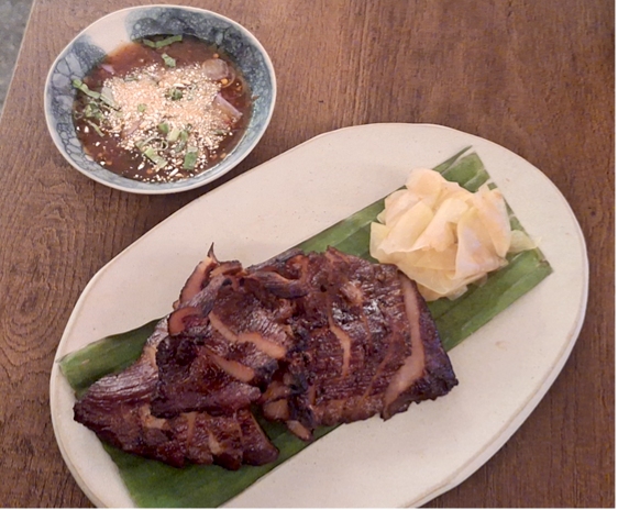 The Sugarcane-smoked Pork Jowl from Bib Gourmand Thai restaurant Jungle (Photo: Jungle)