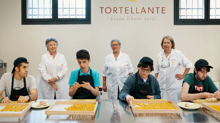 Emilia Panini, Candida Leonardi, and Loredana Grandi with students at Tortellante. Massimo Bottura's son, Charlie, is on the left. (Photo: Maurizio Camagna)