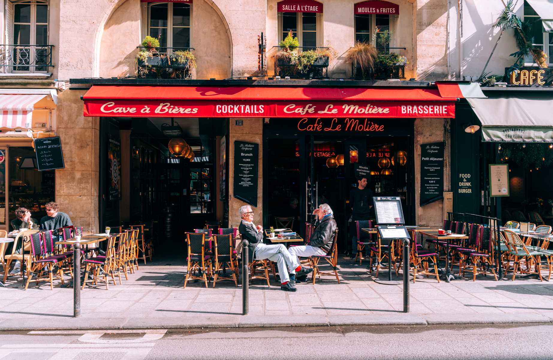 Enjoy espresso and sunshine at a classic Paris café in the Latin Quarter. © Mary Quincy