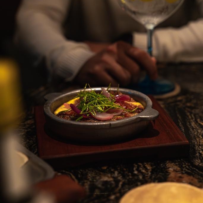 Provoleta with smoked pepper jam from the República del Fuego restaurant. © República del Fuego