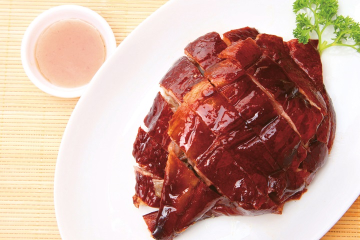 At Kam’s Roast Goose, their house-made version accompanies the signature dish. (©Hardy/Kam's Roast Goose)