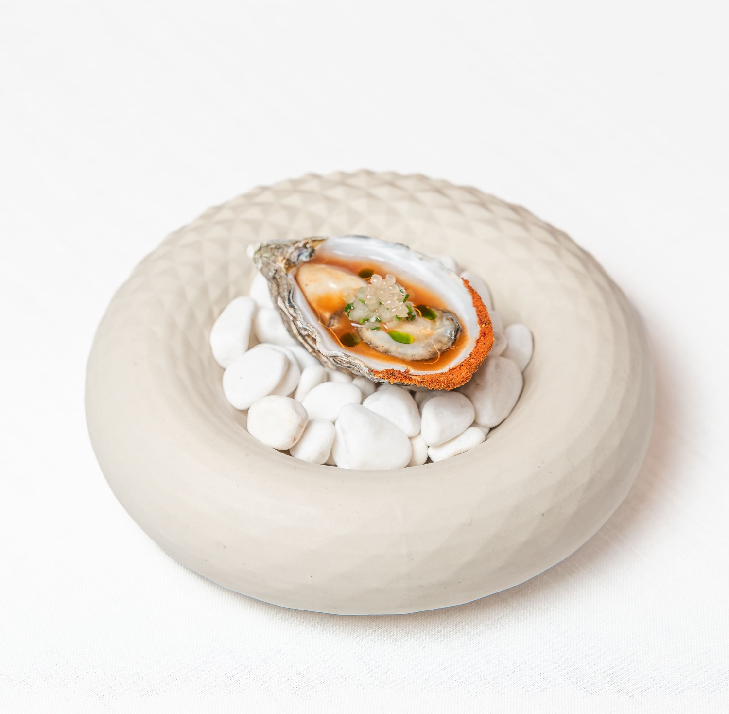 Ostra inspirada en la fusión mexiterránea, una combinación de sabores entre dos mundos. © Can Simoneta