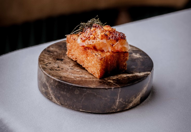 A bite of Tom Brown's seafood-centric cooking at The Capital. © Lateef Okunnu
