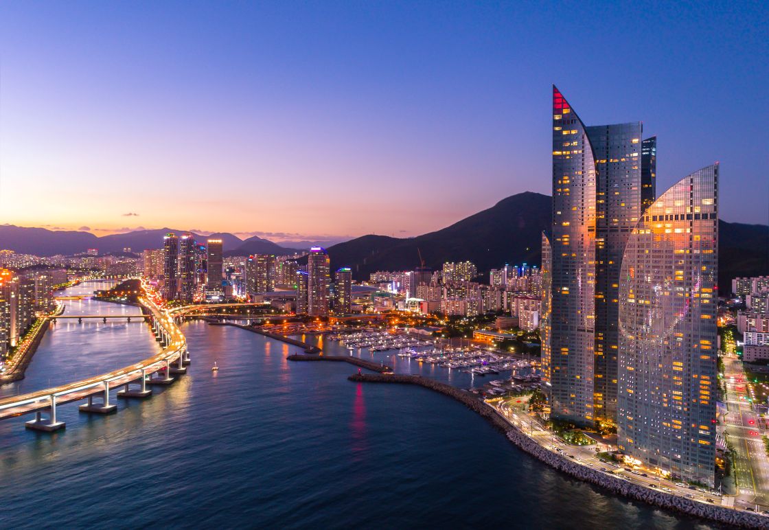 Night view of Gwangandaegyo Bridge and Haeundae’s Marine City skyline, with Park Hyatt Busan on the right.
