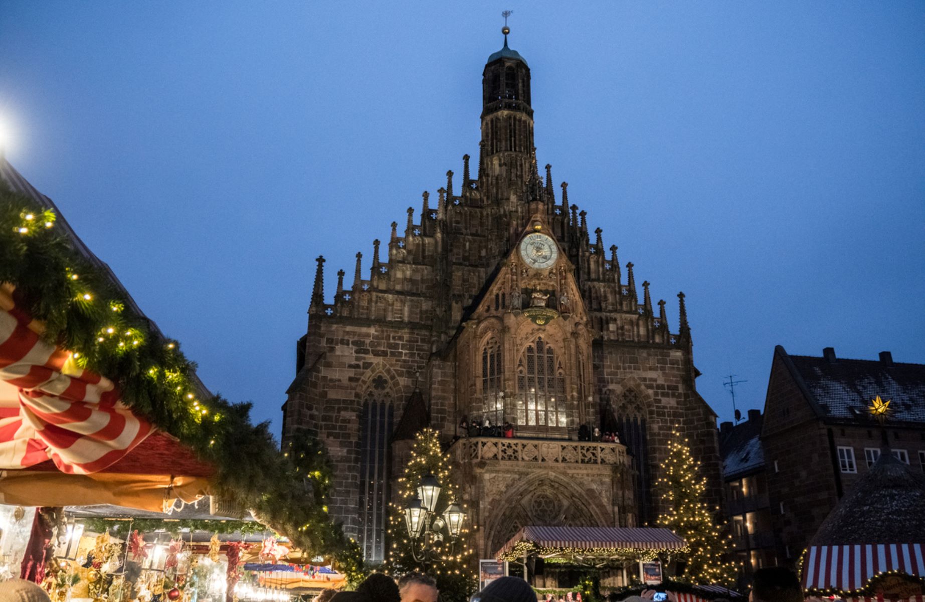  "Frauenkirche" view from the famous Christmas Market in Nuremberg, Germany © J-Picture/iStock