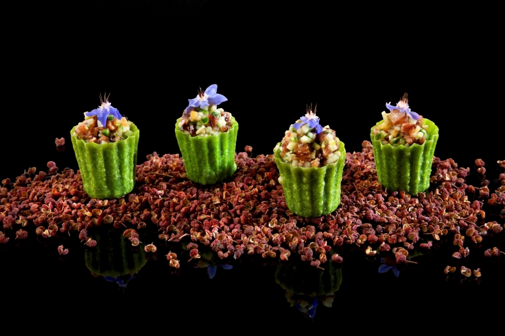 One MICHELIN Star Hakkasan's A5 Wagyu sirloin tartare served in a crispy spinach cup with Szechuan peppercorn. Image credit: Hakkasan