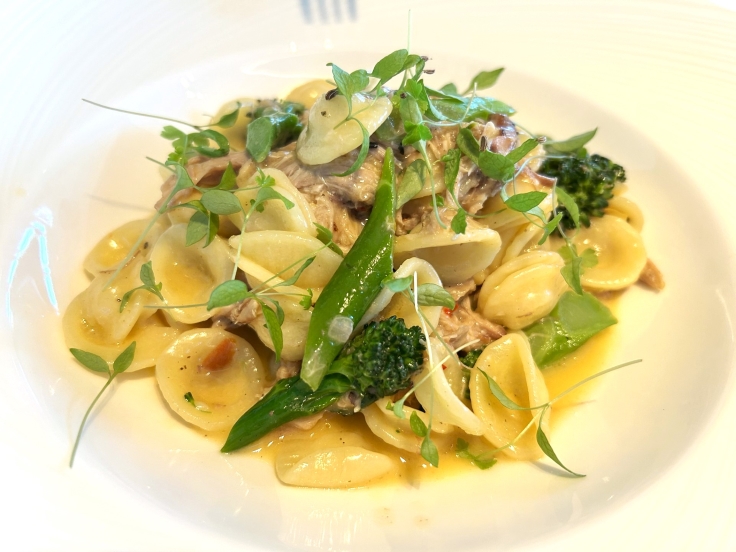 The perfectly portioned dish is made with fine orrechiete pasta and braised rabbit in a light cream sauce. Image credit: The MICHELIN Guide