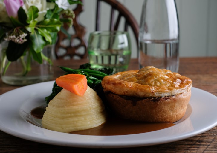 Steak, Mushroom and Ale Pie, served here with mashed potato, at The Cat Inn, West Hoathly. © Taylor Young