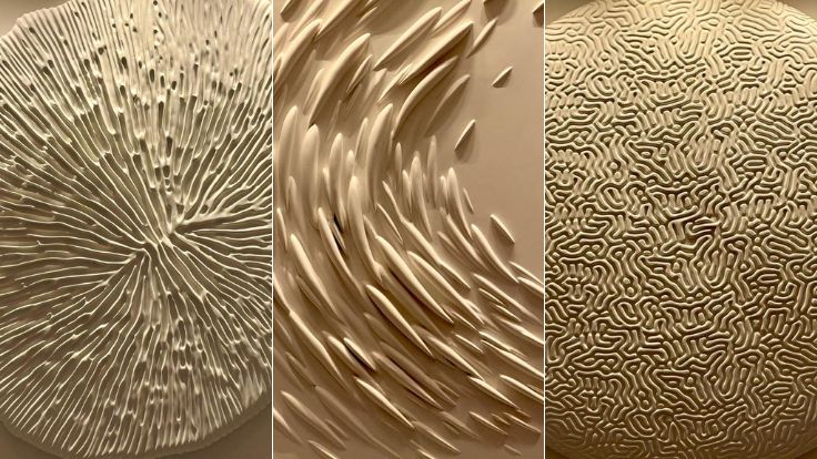 Each elevator lobby leading up to the rooms has a wall adorned with a sculpture alluding to the sea. Image credit: Kelly Sadek