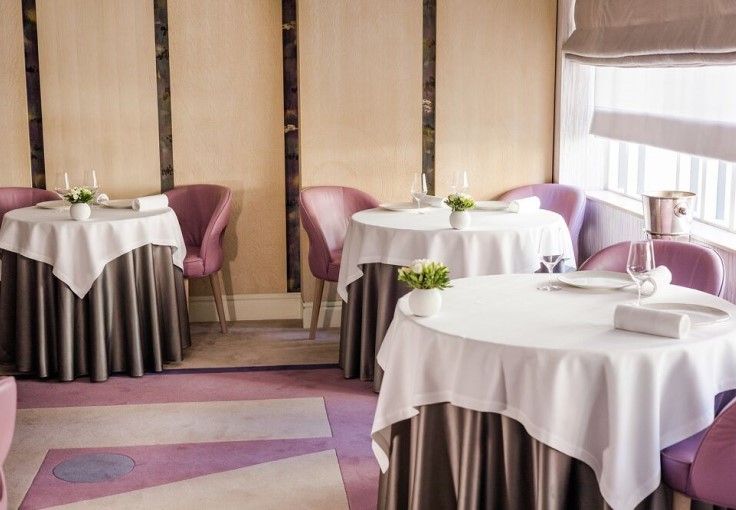 The understatedly elegant dining room at Gordon Ramsay's flagship restaurant. © Gordon Ramsay Restaurants