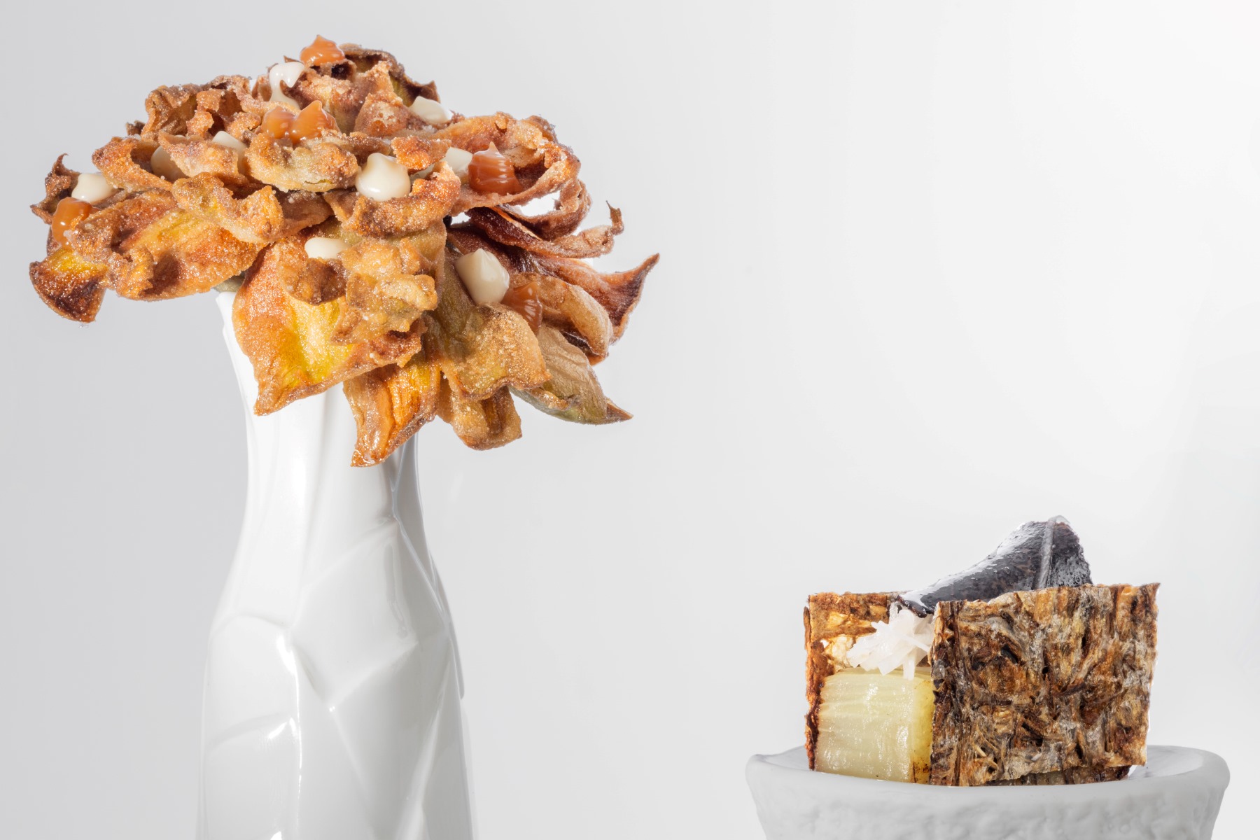 Artichoke flower and its soup with chard and foie gras, at Akelaŕe, led by chef Pedro Subijana Akelaŕe, a restaurant with Three MICHELIN Stars, in Donostia / San Sebastián. © Akelaŕe