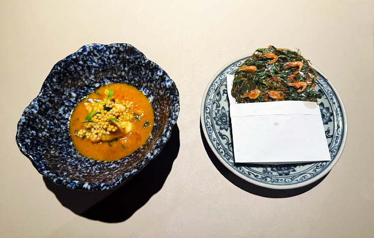 Crab curry with runny crab roe, garuda leaves, and crispy shrimps at Nusara. (© The MICHELIN Guide Thailand)