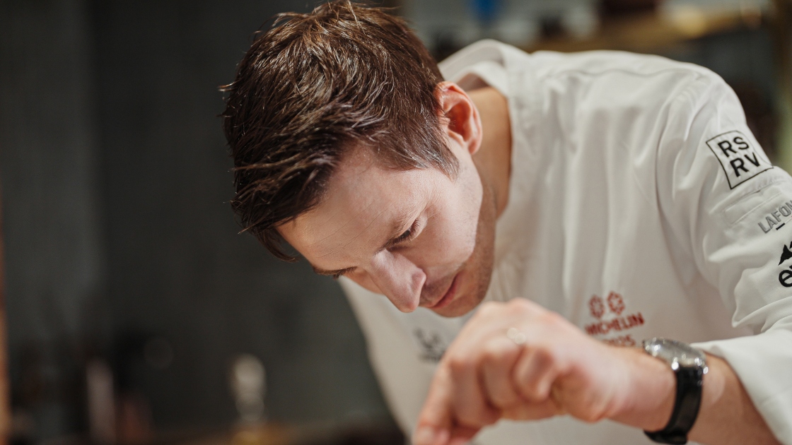 Chef Joseph Lidgerwood puts the final touches on a dish shpaed by patience and craft. ©The MICHELIN Guide