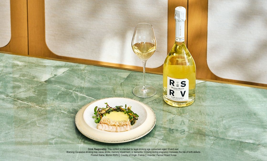 Crisped tilefish with chicken-fat beurre blanc meets the saline edge and bright citrus of RSRV Blanc de Blancs 2015. ©The MICHELIN Guide