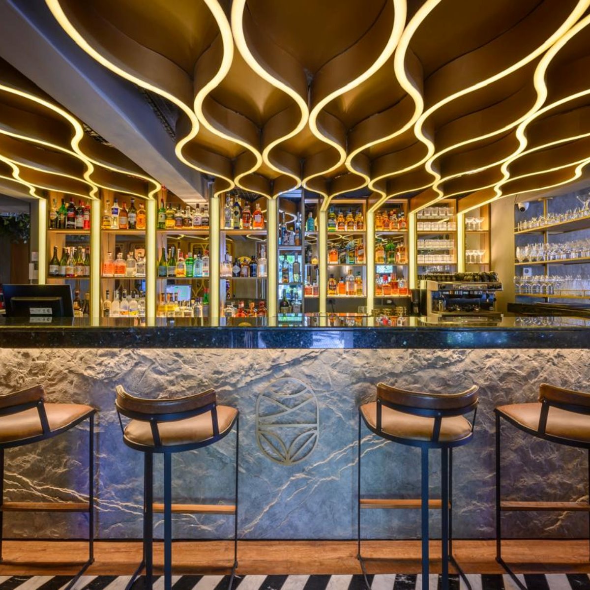 The striking bar at Soberana in Mendoza, where Argentine dishes feature influences from around the world. © Soberana