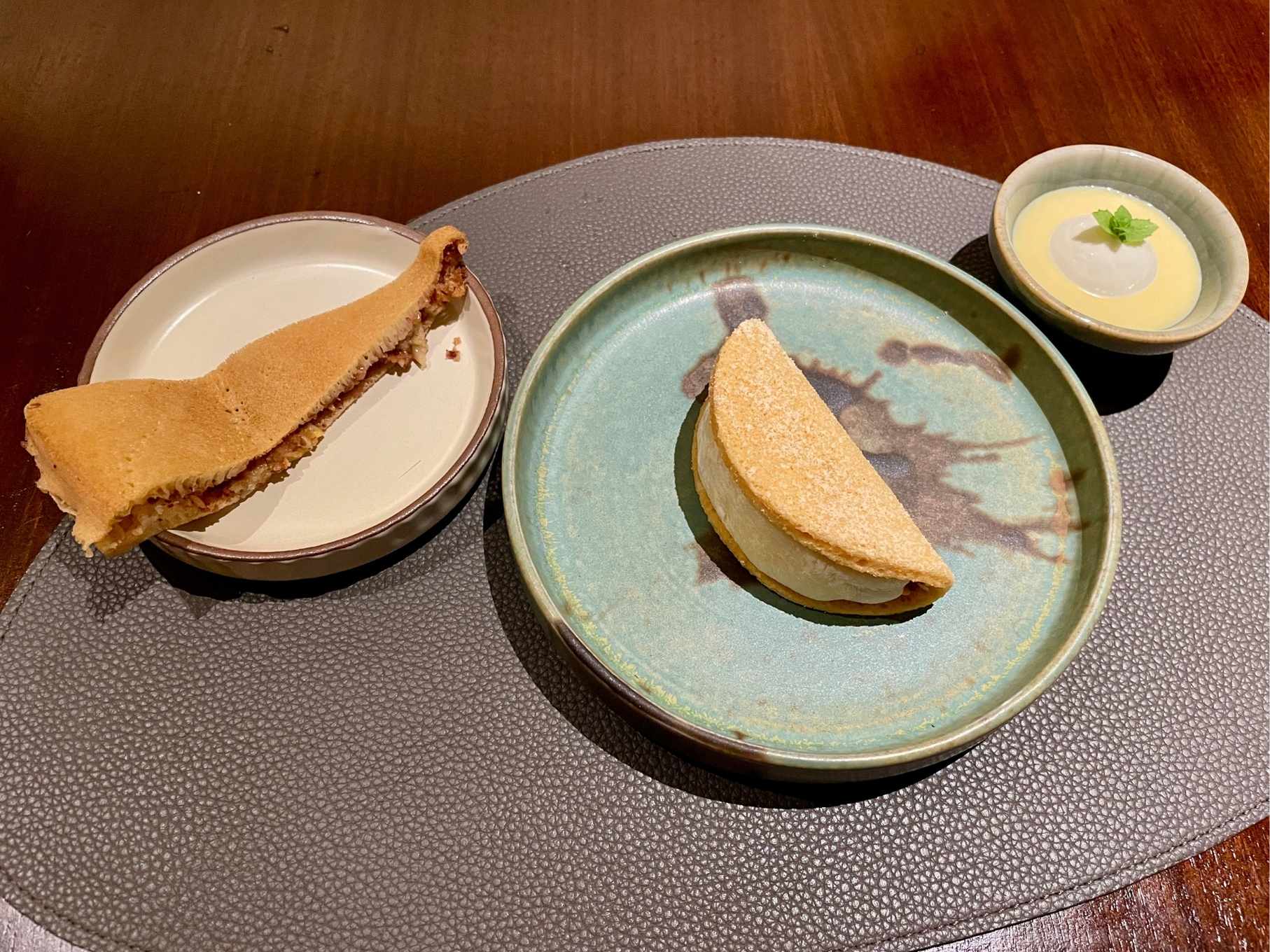 The apam balik dessert, served with the classic street vendor version on the left for comparison. © The MICHELIN Guide