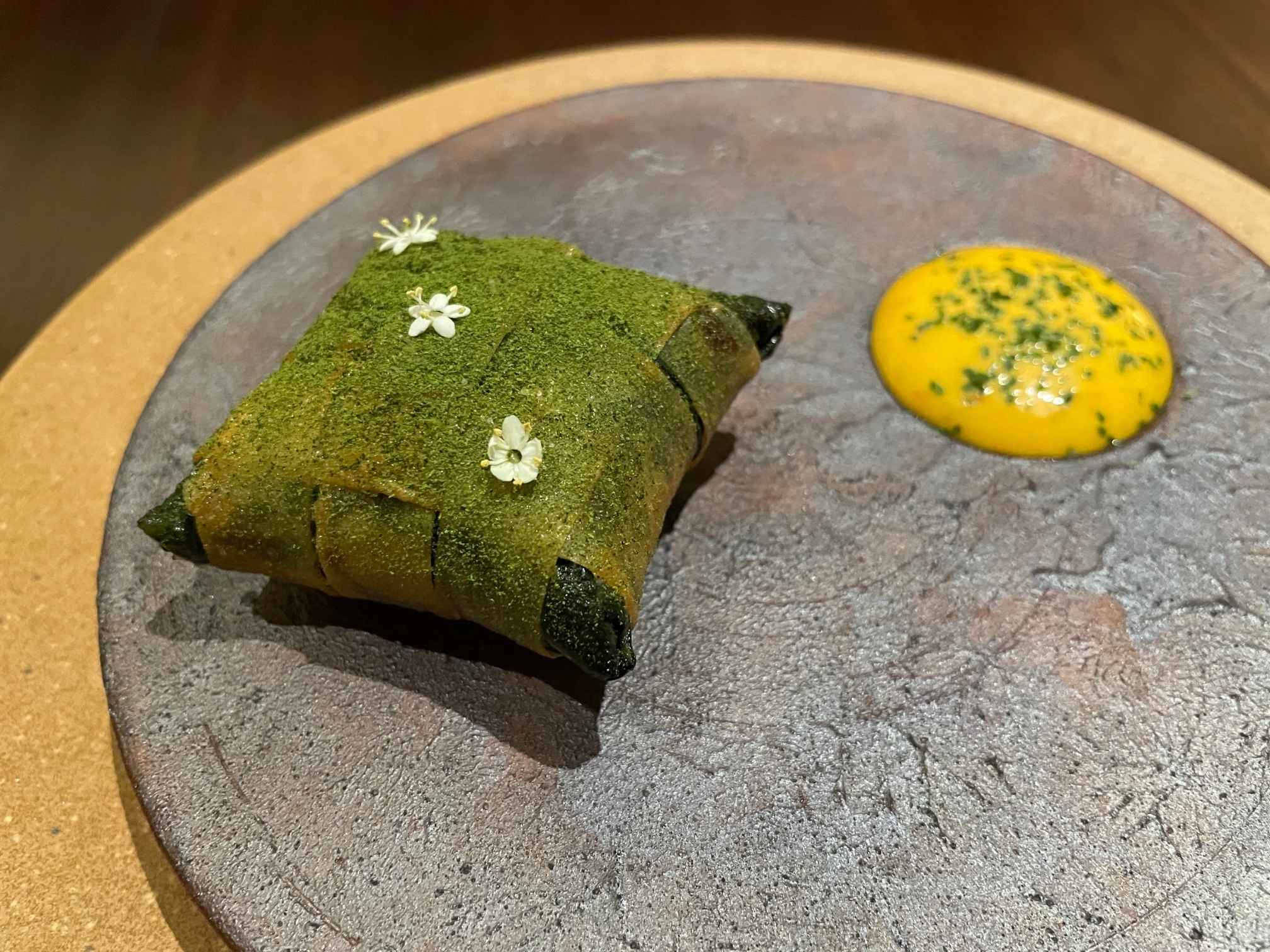 Akar's interpretation of ketupat, a traditional Malaysian dish, left a lasting impression on the Inspector. © The MICHELIN Guide