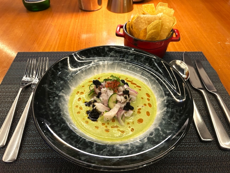 Refreshing in flavor and tone, this sea bass aguichile is must-try at Hunters Room & Grill. © MICHELIN Guide