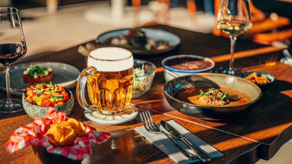 Variety of dishes with beer at MICHELIN recommended restaurant Soyka. © Matěj Gajdošík 