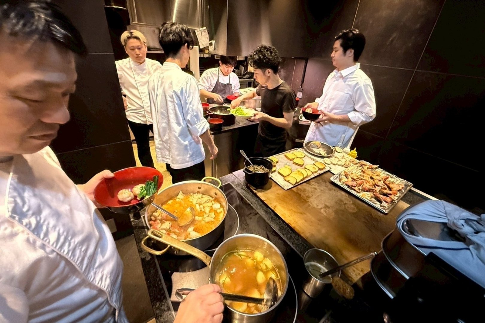 At Two-MICHELIN-starred Ryuzu, the Japanese saying to "eat from the same pot of rice" shapes their approach to family meal. © Ryuzu