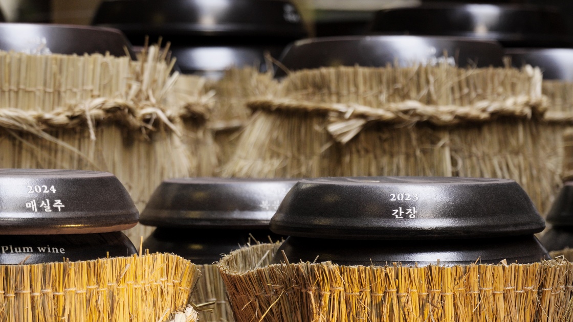 At One-MICHELIN-Starred 7th Door, Chef Kim Dae-chun prepares more than 50 fermented ingredients each year — from soy sauce to plum syrup — aging them in traditional jangdok. © MICHELIN