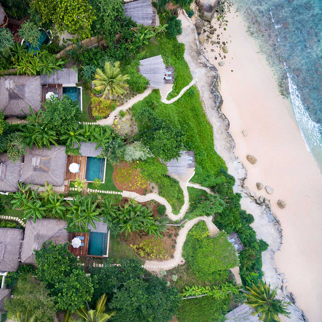 An aerial view of the beachside accommodations at Nihi Sumba in Indonesia. © Nihi Sumba