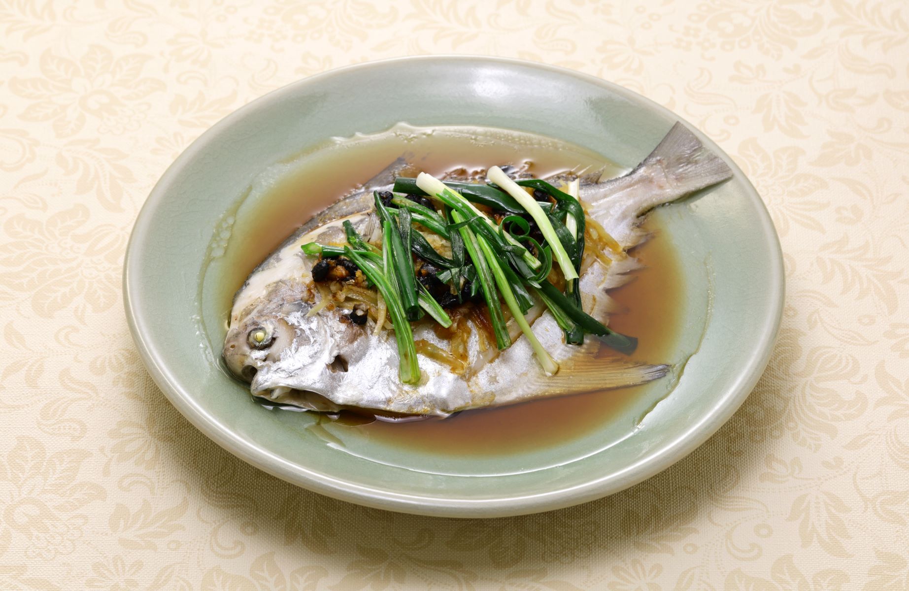 Whole steamed fish. © Bon Chan/Shutterstock